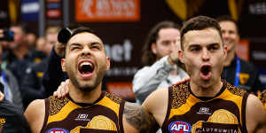 After last week’s heartbreaking loss,Hawthorn players celebrated their win over Brisbane Lions with gusto.