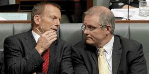 Follow the leader … Morrison with Tony Abbott during question time in federal parliament.