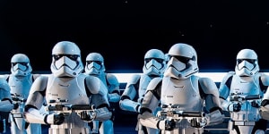 Inside a hangar bay of a Star Destroyer,50 Stormtroopers greet riders on Rise of the Resistance