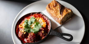 Xiu mai - chicken and veal meatballs baked in tomato sugo with tofu and egg.