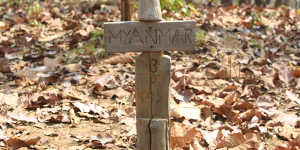 Border mark:Just across the border from north-west Thailand,Burmese civilians and resistance fighters have been left to fend for themselves. 