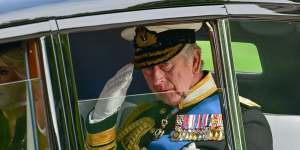 LONDON,ENGLAND - SEPTEMBER 19:King Charles III and Camilla,Queen Consort are seen in a car as the coffin of Queen Elizabeth II is transferred from the gun carriage to the hearse at Wellington Arch following the State Funeral of Queen Elizabeth II at Westminster Abbey on September 19,2022 in London,England. Elizabeth Alexandra Mary Windsor was born in Bruton Street,Mayfair,London on 21 April 1926. She married Prince Philip in 1947 and ascended the throne of the United Kingdom and Commonwealth on 6 February 1952 after the death of her Father,King George VI. Queen Elizabeth II died at Balmoral Castle in Scotland on September 8,2022,and is succeeded by her eldest son,King Charles III. (Photo by Andy Stenning - WPA Pool/Getty Images)