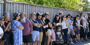 A crowd lines up for the auction at 41A Jacka Street Preston on Saturday,where the house sold for $1.2 million. 