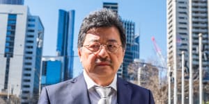 One of the fresh photos taken of elusive TPG executive chairman David Teoh as he arrived at court in Melbourne on Wednesday.