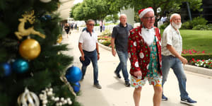 Racegoers arrive at Rosehill for Festival Stakes Day last Saturday. Meanwhile,senior personnel were working on a deal to redevelop the track.