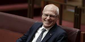 Senator Jim Molan reacts prior to delivering his first speech in the Senate at Parliament House in Canberra. 