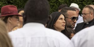 Leila and Danny Abdallah at the funeral of three of their six children.