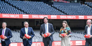 AFL chief executive Gillon McLachlan (centre),with (from left) Seven’s James Warburton,Foxtel’s Patrick Delaney and Siobhan McKenna and Telstra’s Kim Krogh Andersen.