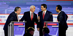 Chris Christie (left),Mike Pence,Ron DeSantis and Vivek Ramaswamy at the first Republican presidential debate,which was skipped by Donald Trump.
