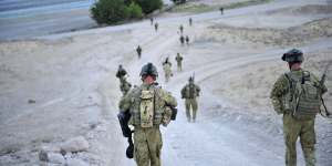 Manslaughter charges against two Australian commandos have been dismissed.