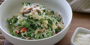 Orzo (risoni) pasta with rocket and pine nuts.