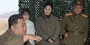 Kim Jong-un shows daughter for the first time at ballistic missile test