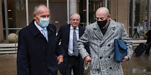 Chris Dawson,left,and his brother Peter leave the Supreme Court on Monday.