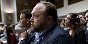 Alex Jones listens during a Senate Intelligence Committee hearing in Washington,DC. 