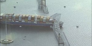 Parts of the Francis Scott Key Bridge remain after a container ship collided with one of the bridge’s support pylons.