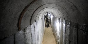 An armed guard inside one of the tunnels on the Gaza-Israeli border.