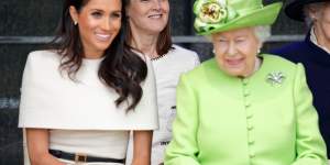 Meghan,Duchess of Sussex,and the Queen with Australian Samantha Cohen behind them.