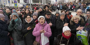 People in Moscow gather near the church where Navalny’s funeral was held.