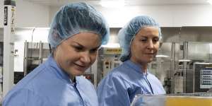 AstraZeneca staff Penny George and Geraldine Murphy at the firm’s Sydney production plant.
