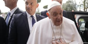 Pope Francis leaves hospital after treatment for bronchitis,saying ‘I’m still alive’