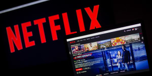 An Apple Inc. laptop displays the home screen for the Netflix Inc. original series'The Mechanism'next to signage on a television monitor in an arranged photograph taken in Sao Paulo,Brazil,on Wednesday,March 28,2018. While the world rebels against Facebook Inc.,Netflix Inc. is stirring up controversy in Brazil. A #DeleteNetflix campaign has burst forth on Twitter since"The Mechanism,"a show that is a work of fiction based on the real-life,multi-year corruption probe dubbed Carwash,was added to the streaming service Friday. Photographer:Rodrigo Capote/Bloomberg