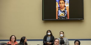 Miah Cerrillo,a survivor of the mass shooting,appears on a screen during a House Committee on Oversight and Reform hearing on gun violence.