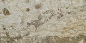 The cave art depicts half-human figures in hunting scenes and has been dated to at least 44,000 years old
