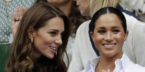 Britain’s Kate,Duchess of Cambridge,left,and Meghan,Duchess of Sussex in 2019.