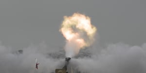 An Israeli mobile artillery unit fires a shell from southern Israel towards the Gaza Strip on Sunday.