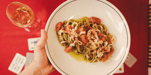 Toasted seaweed linguine with cuttlefish and confit tomato.