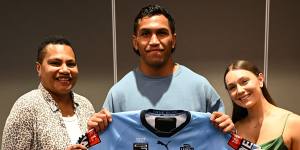 NSW debutant Jacob Saifiti with mother Bev and partner Immogen Rodier.