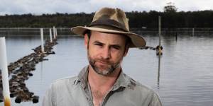 Sydney rock oyster farmer Brad Verdich,from ASX company East 33,is asking the public to understand why oysters are more expensive and harder to come by this summer.