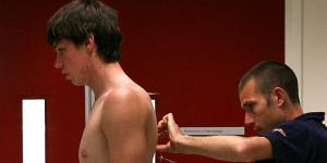 Former Blue Matthew Kreuzer has his skin folds checked at a draft camp in 2007.