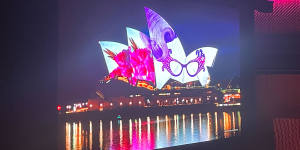 The Sydney Opera House sails lit in honour of Barry Humphries
