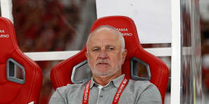 Graham Arnold deals with more dejection against Indonesia from the dugout in Jakarta.