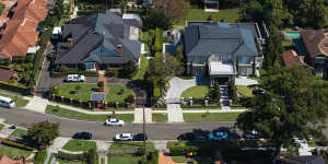 The Hales family mega-mansions:On the left the home of global leader Bruce Hales and his wife Jenny,on the right the home of Gareth Hales,and at the rear a new mansion is taking shape to be the home of Charles Hales.