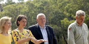 NSW Minister for the Environment Gabriel Upton,NSW Premier Gladys Berejiklian,Lee Evans MP and Glenn Meade,Operations Manager of the National Park and Wildlife Service at the Royal National Park,south of Sydney on Monday.