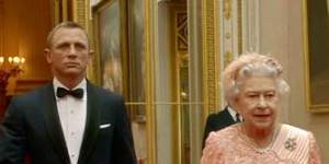 James Bond actor Daniel Craig escorts Queen Elizabeth II through the corridors of Buckingham Palace in a short film created for the opening ceremony of the London Olympics. 