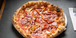 Pizza Diavola with spicy salami,onion and roasted capsicum.