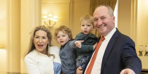 Barnaby Joyce poses for photos with partner Vikki Campion and children Sebastian and Thomas during the swearing-in ceremony as Deputy Prime Minister.