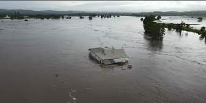 NSW weather LIVE updates:‘Extreme’ rain to last until Thursday;Warragamba Dam spills over;Chester Hill residents recover from ‘mini-tornado’