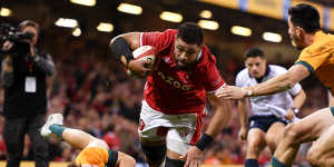 Taulupe Faletau scores for Wales but the Wallabies managed to fight back.