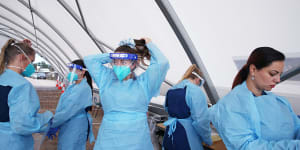 Nurses prepare to conduct COVID-19 tests at Bondi Beach testing clinic in Sydney. 