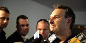 Chris Pelchen speaks to the media scrum in trade week in his Hawthorn days in 2009.