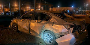 A damaged car is parked at an Aramco terminal in the southern border town of Jizan,Saudi Arabia.