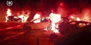 Vehicles on fire in Israel in Lod.