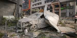 A destroyed car following an Israeli airstrike in Gaza City on Sunday.