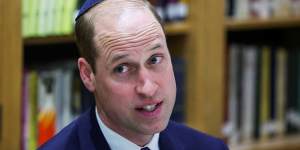 Prince William,Prince of Wales wears a kippah on a visit to the Western Marble Arch Synagogue in London on Thursday.