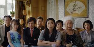 Awkwafina (centre) plays a woman railing against a family lie in Lulu Wang’s breakthrough,The Farewell.