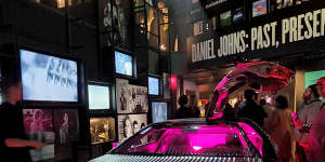 The exhibition’s centrepiece,a stainless steel DeLorean sports car.